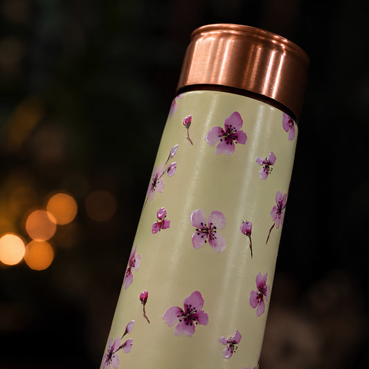 Purple floral UV embossed design closeup on Tamrit copper bottle