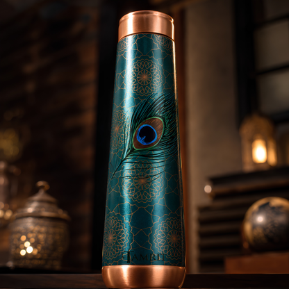 Tamrit Curo teal copper water bottle with peacock feather design
