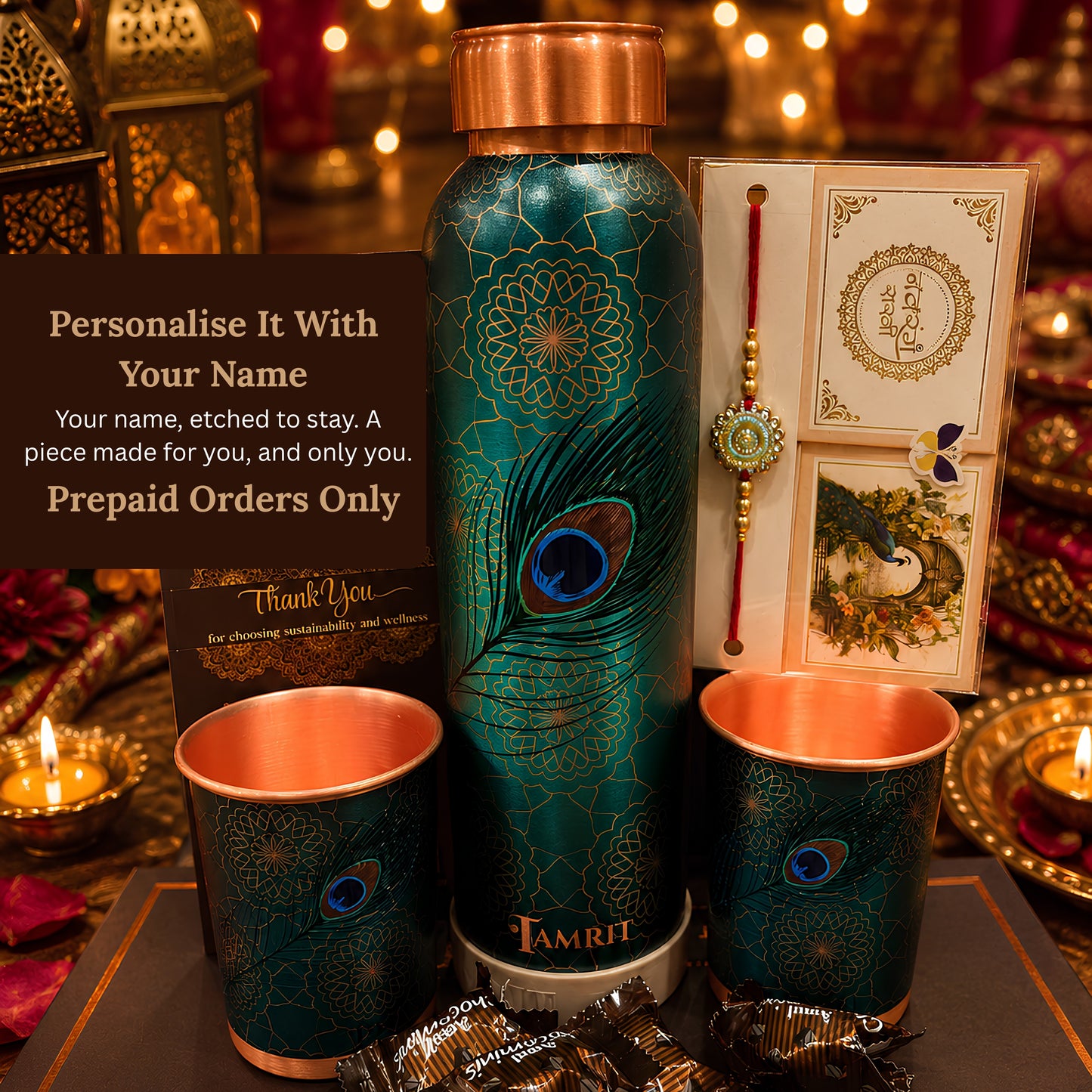 Copper bottle and glass set arranged in brown rigid Rakhi gift box with rakhi and Amul chocolates