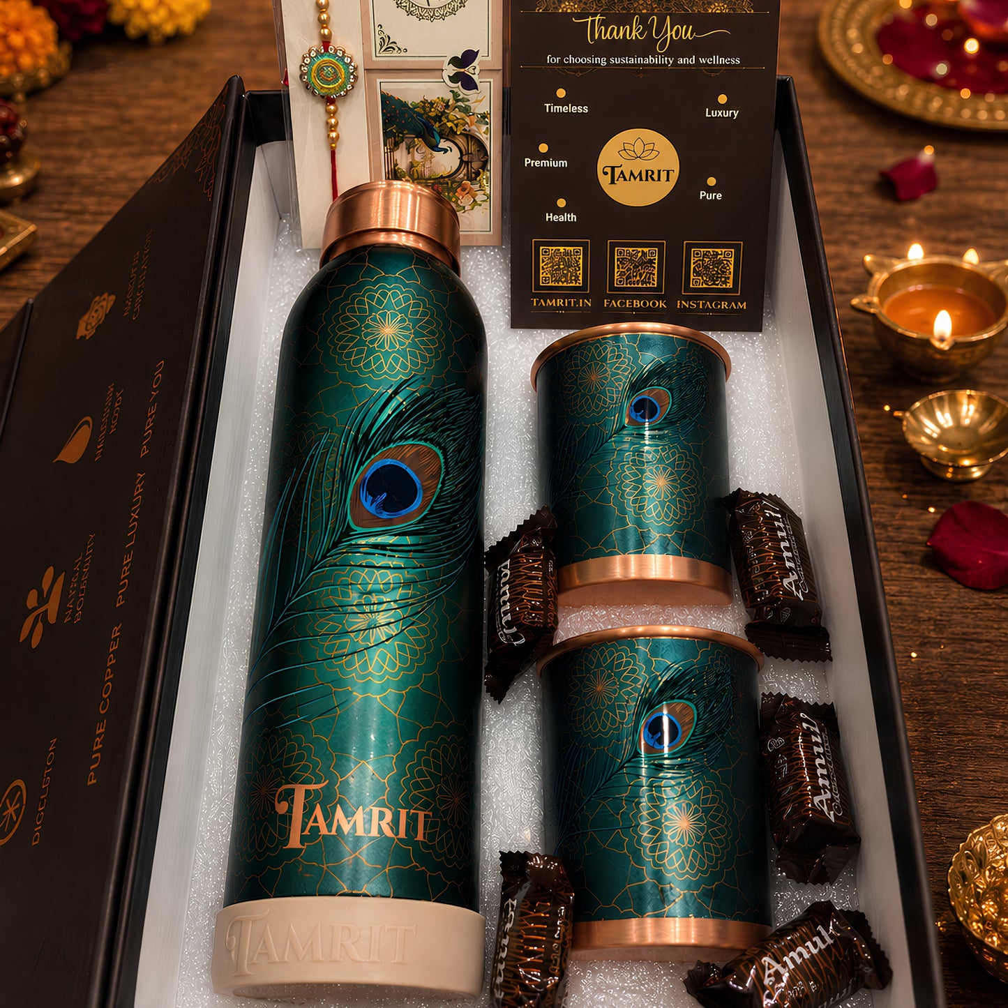 Tamrit Rakhi gift hamper for brother with UV embossed copper bottle and 2 copper glasses