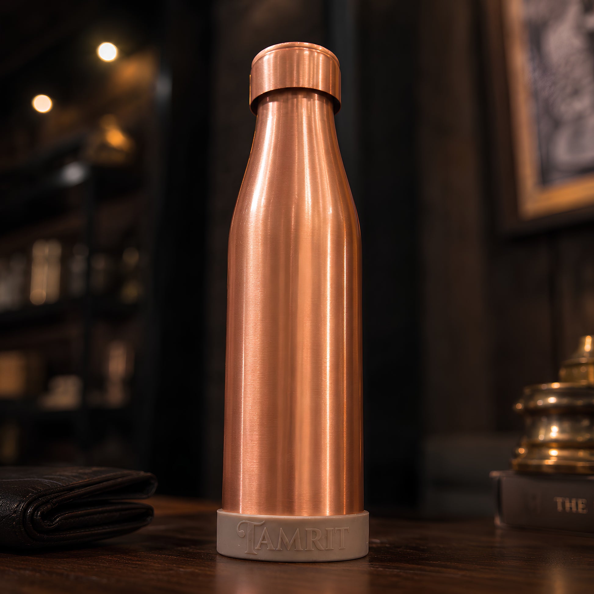 Tamrit copper bottle held to show 1 Litre pure copper matte finish