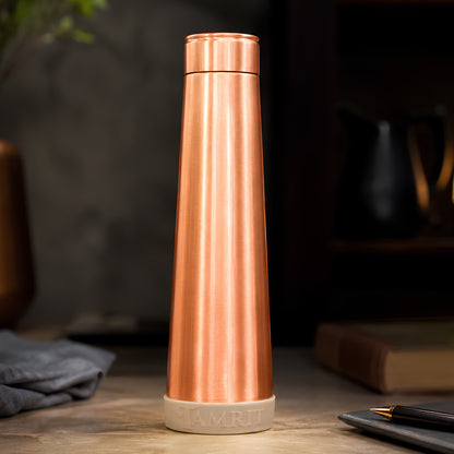 Tamrit copper bottle held to show 1 Litre pure copper matte finish