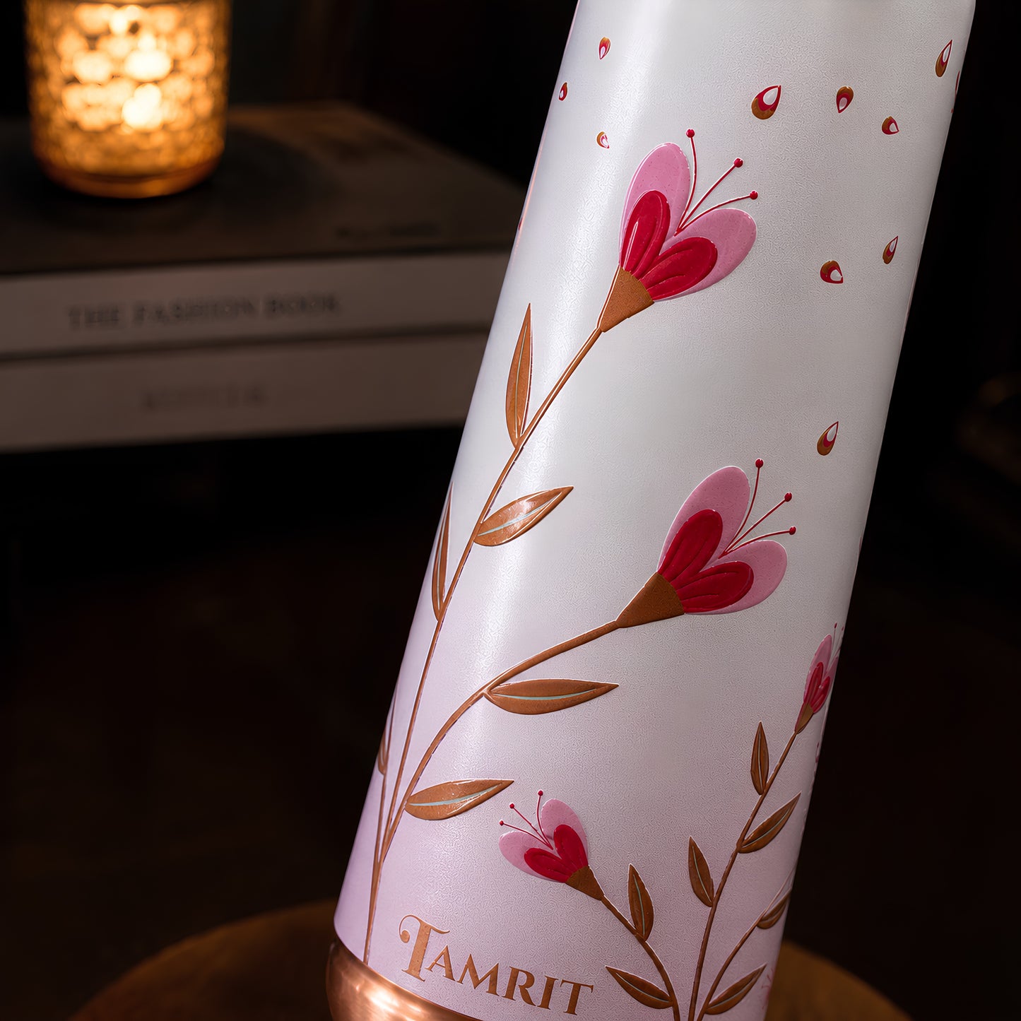 Pink floral UV embossed design closeup on Tamrit Curo copper bottle