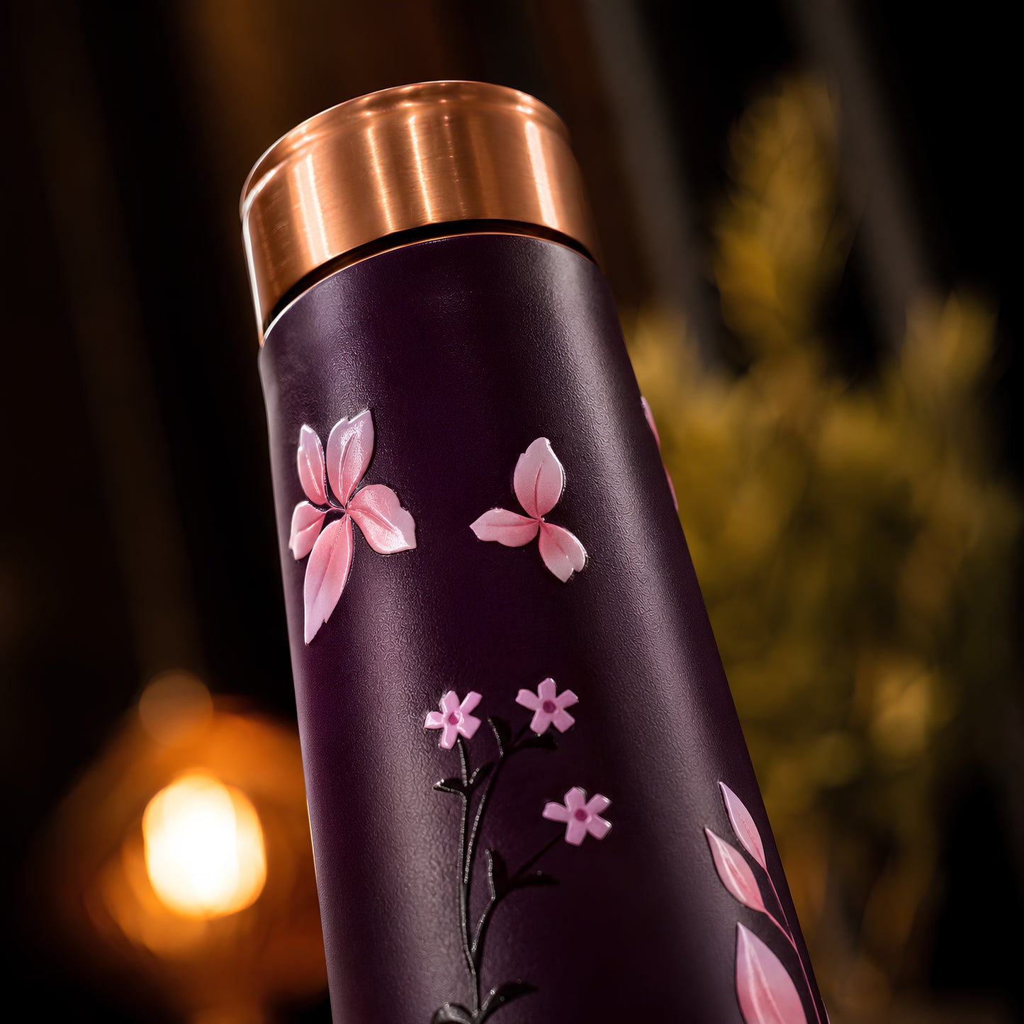 Pink cherry blossom UV embossed design closeup on Tamrit copper bottle