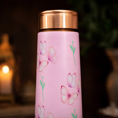 Cherry blossom UV embossed design closeup on Tamrit pink copper bottle