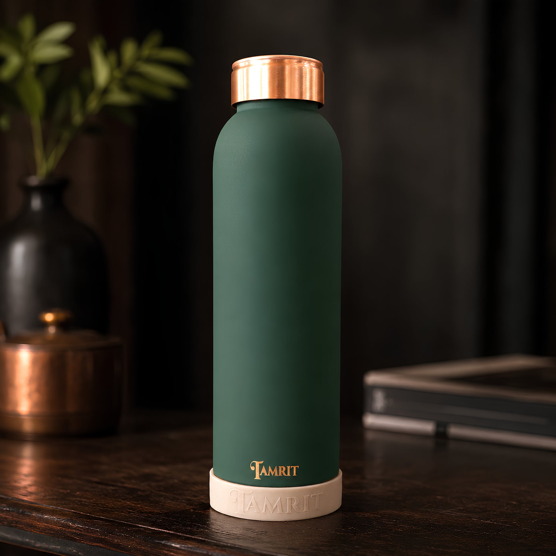 Tamrit CuPro green copper bottle standing view on wooden table
