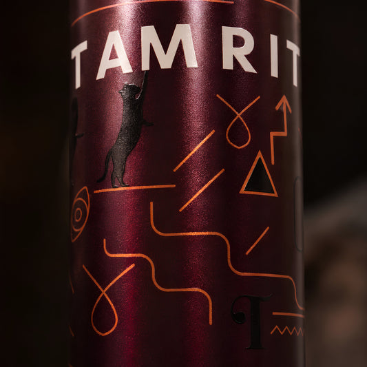Tamrit wordmark and geometric UV embossed pattern on Tamrit copper bottle