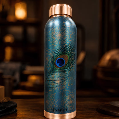 Tamrit CuPro teal copper water bottle with peacock feather design

